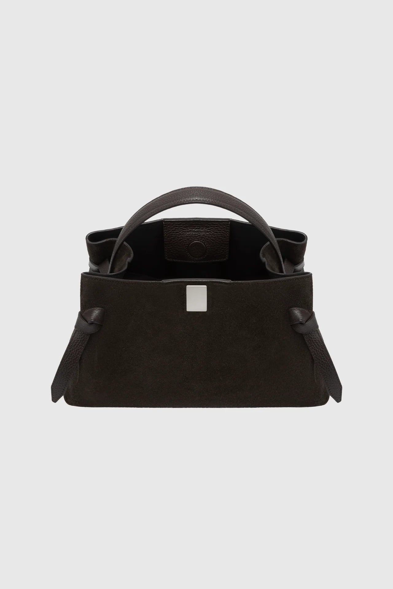 Black handbag with a white logo on a light gray background