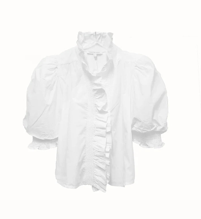 White blouse with ruffled details on a white background