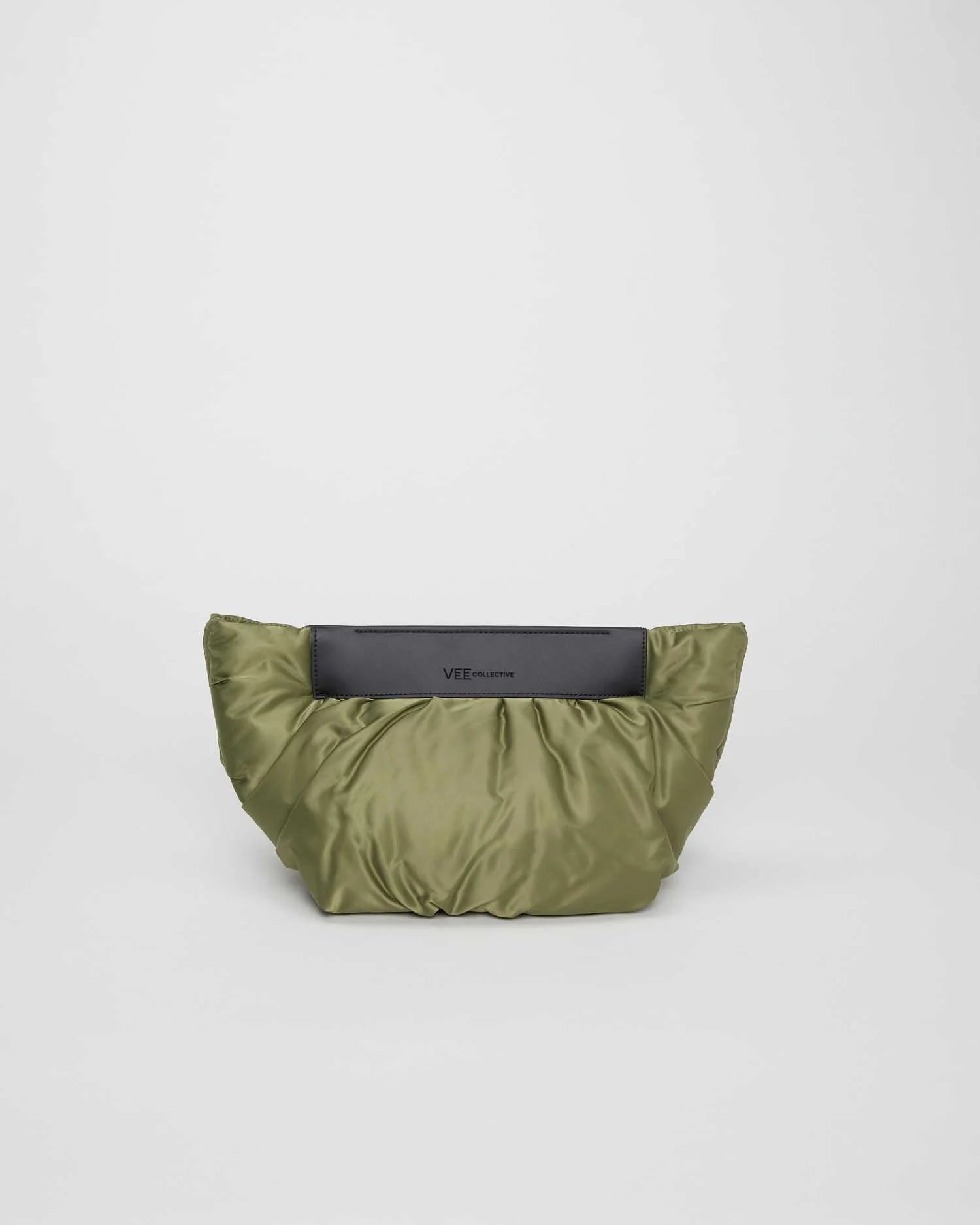 Green pouch with a black interior on a light gray background