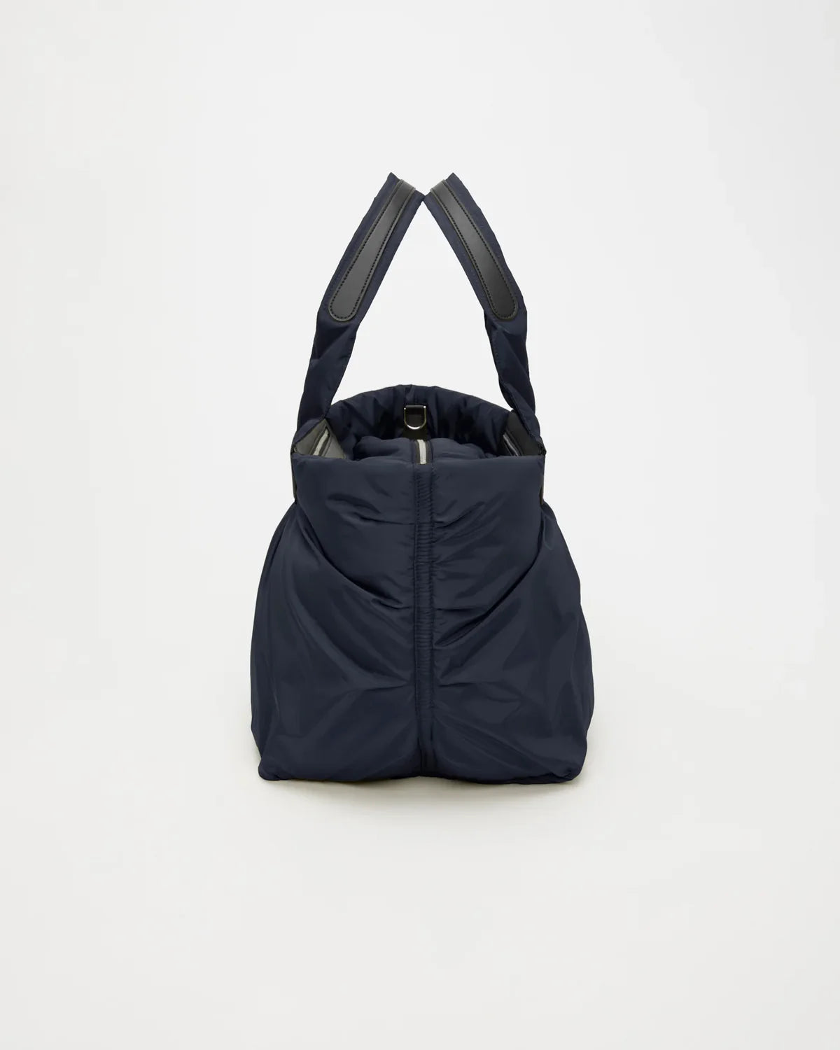 Black tote bag with shoulder straps on a white background