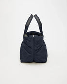 Black tote bag with shoulder straps on a white background