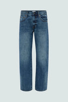 Blue jeans on a light gray background