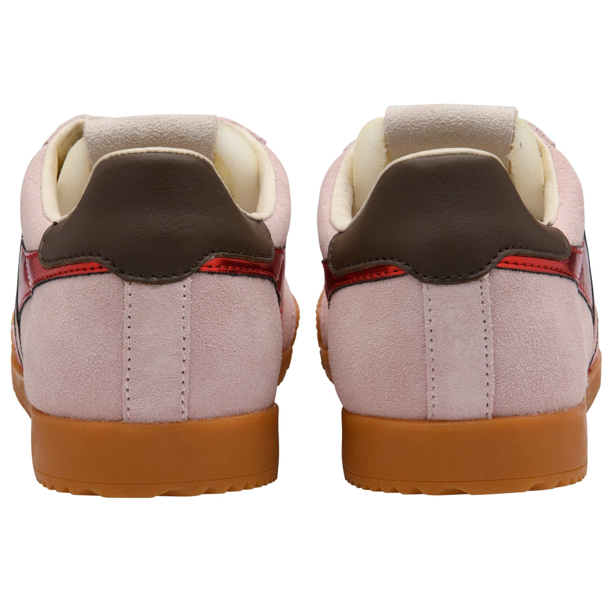 Pair of pink sneakers with brown accents on a white background