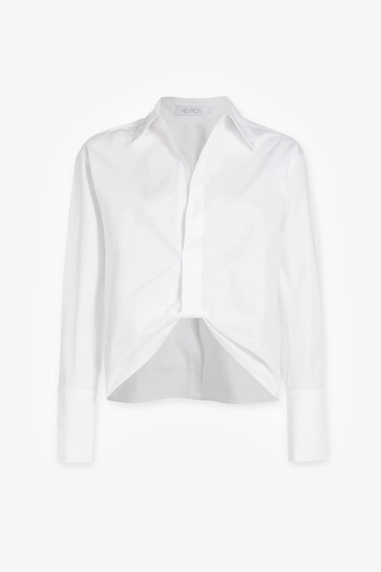 White blouse with a unique front design on a white background