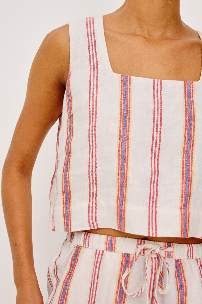 Striped sleeveless top and shorts set on a plain background
