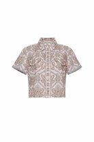 Short-sleeve shirt with a pattern on a white background