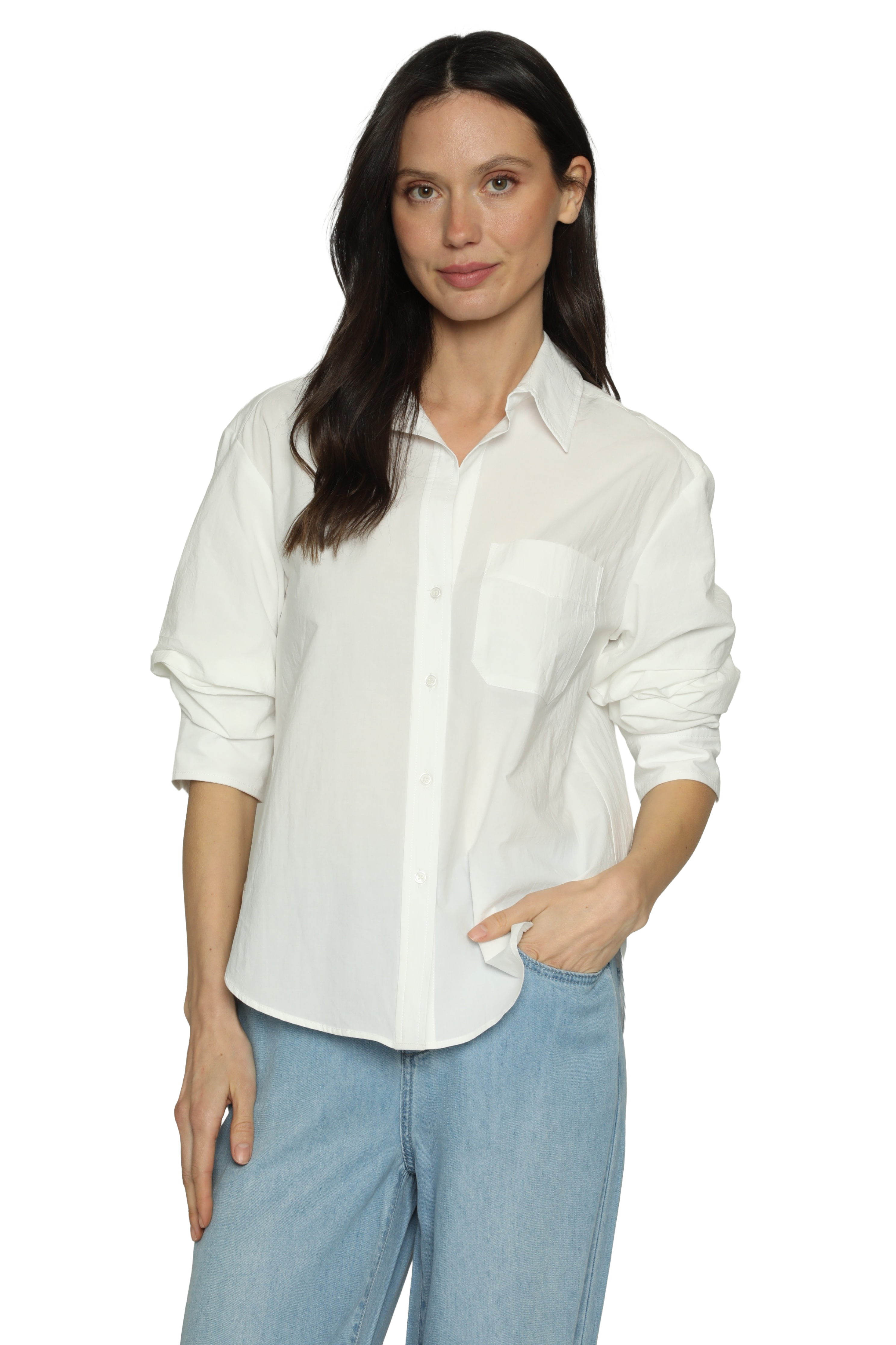 Woman wearing a white shirt and blue jeans on a white background