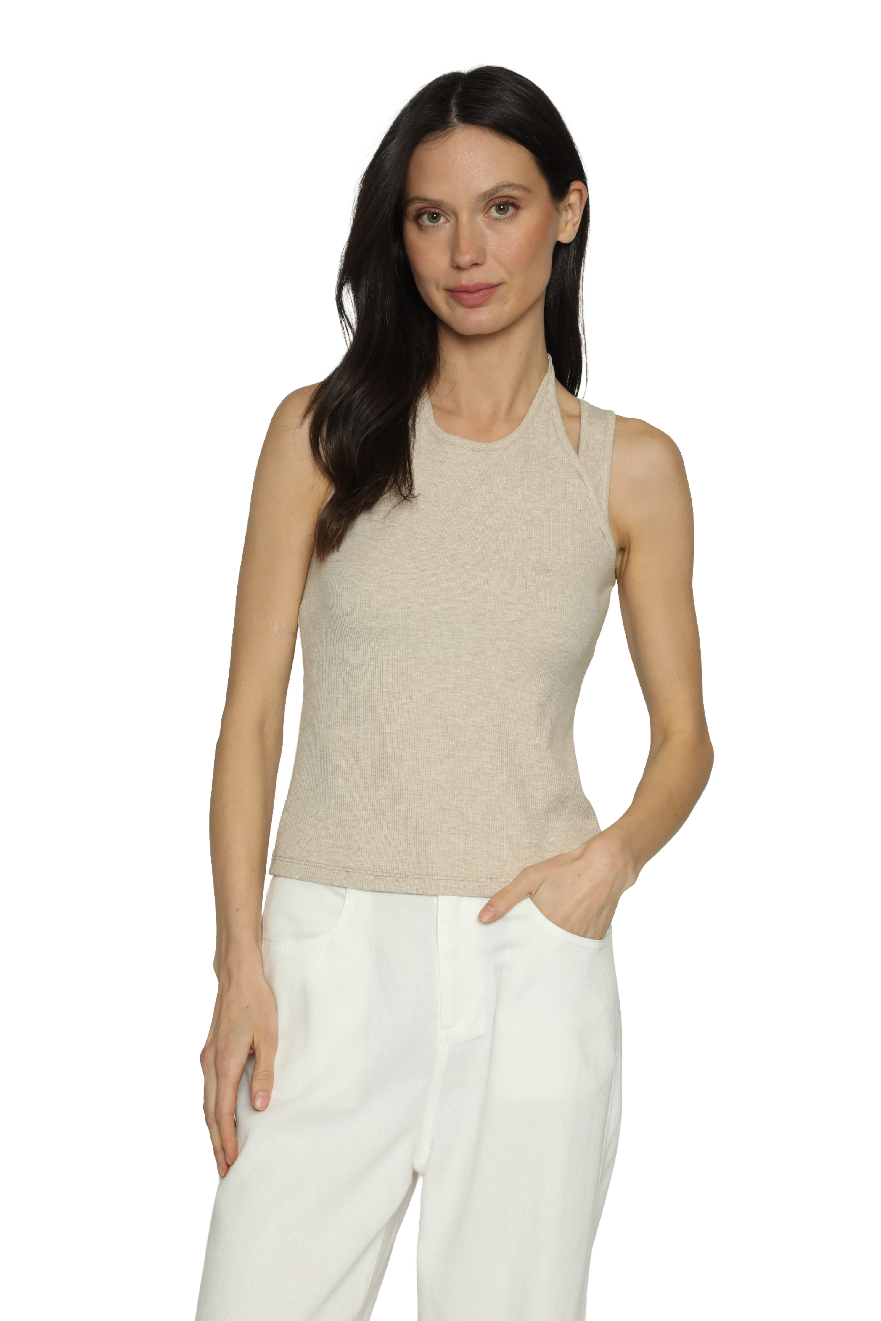 Woman wearing a beige sleeveless top and white pants on a white background