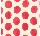 Pattern of red polka dots on a beige background