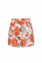 Floral shorts with orange flowers on a white background