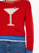 Red sweater with a martini glass design and 'Molotov' text on a white background