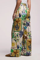 Colorful patterned pants with a neutral background