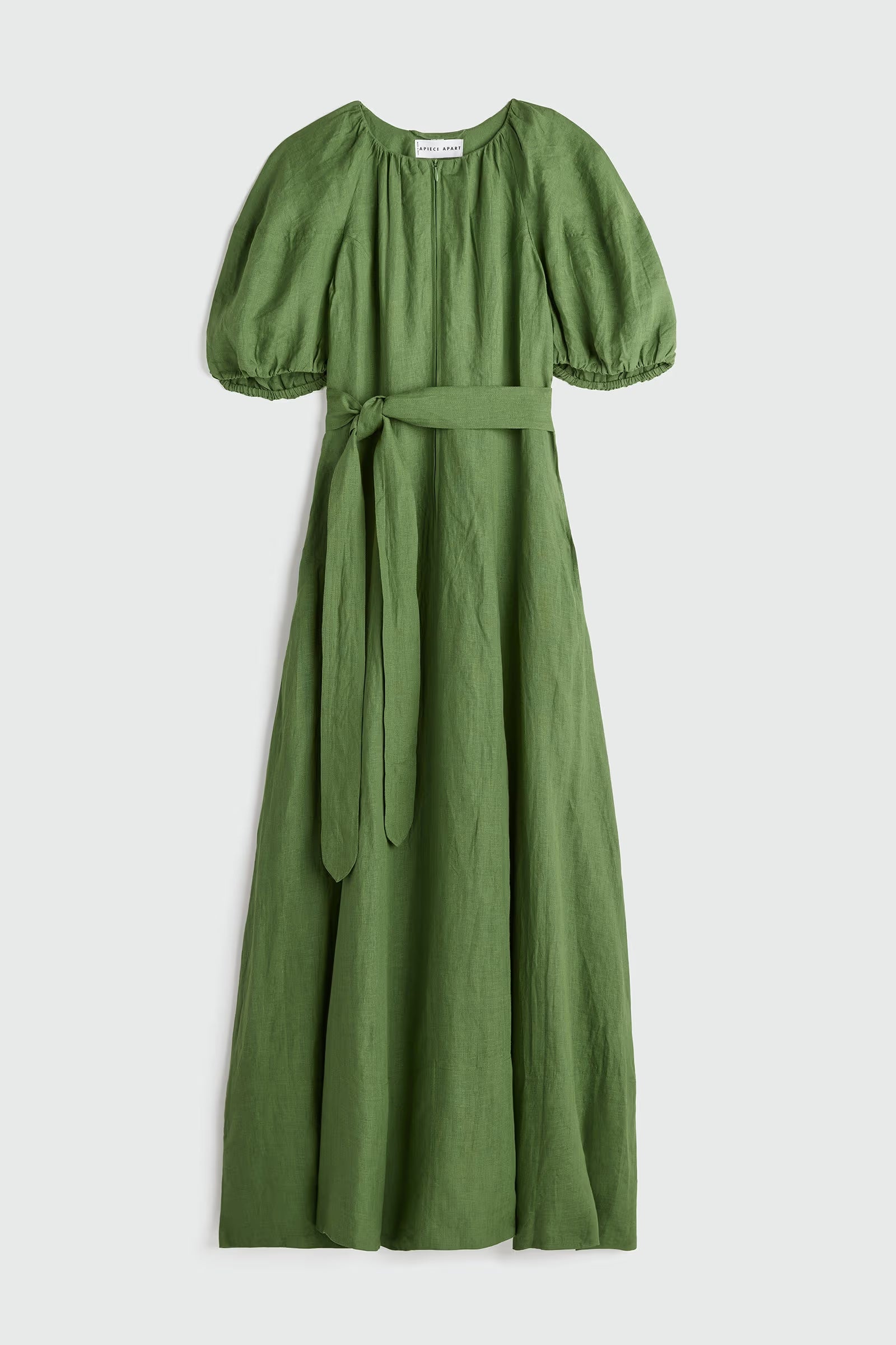 Green dress with puff sleeves on a white background