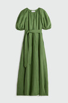 Green dress with puff sleeves on a white background