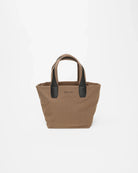 Brown tote bag with black handles on a white background