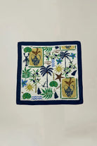 Decorative square patch with nature-themed design on a plain background