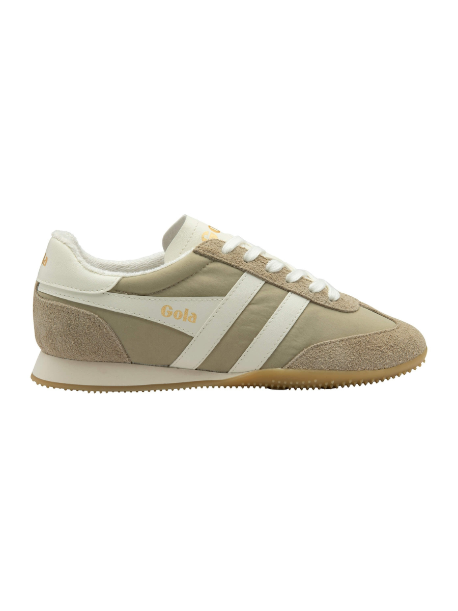 Gray sneakers with white soles on a light gray background