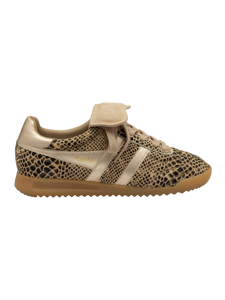 Beige sneaker with snake print pattern on a white background