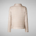 Beige puffer jacket on a light gray background