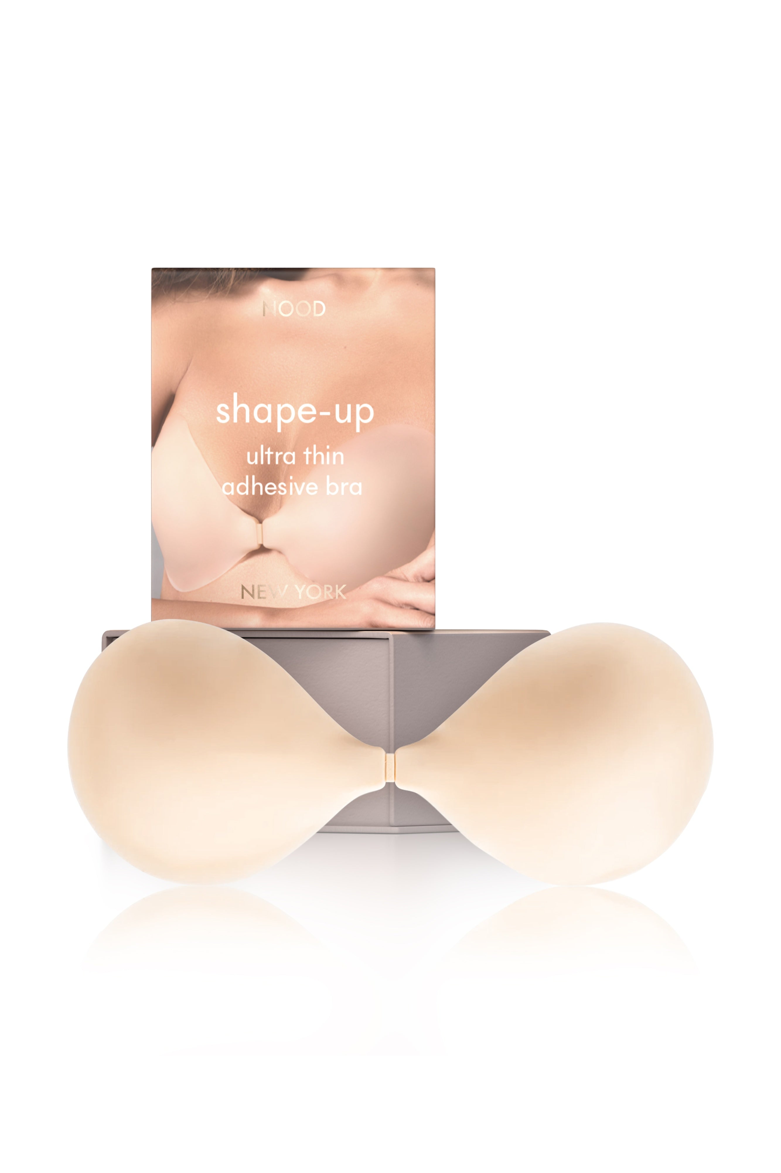 N shaped silicone bralette with packaging labeled 'shape-up' on a white background