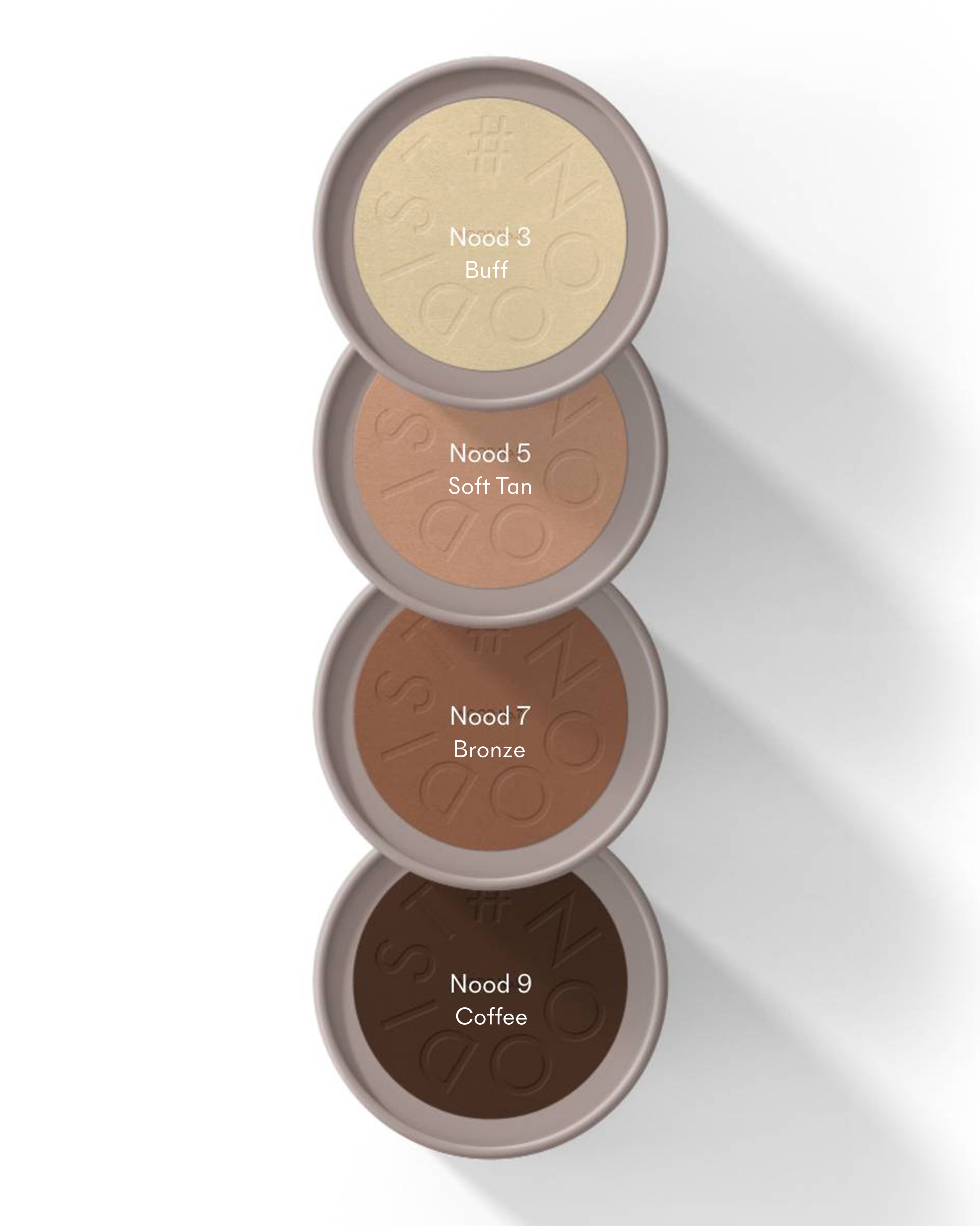 Four open makeup compact powders stacked vertically on a white background, showing shades labeled Nood 3, Nood 5, Nood 7, and Nood 9.