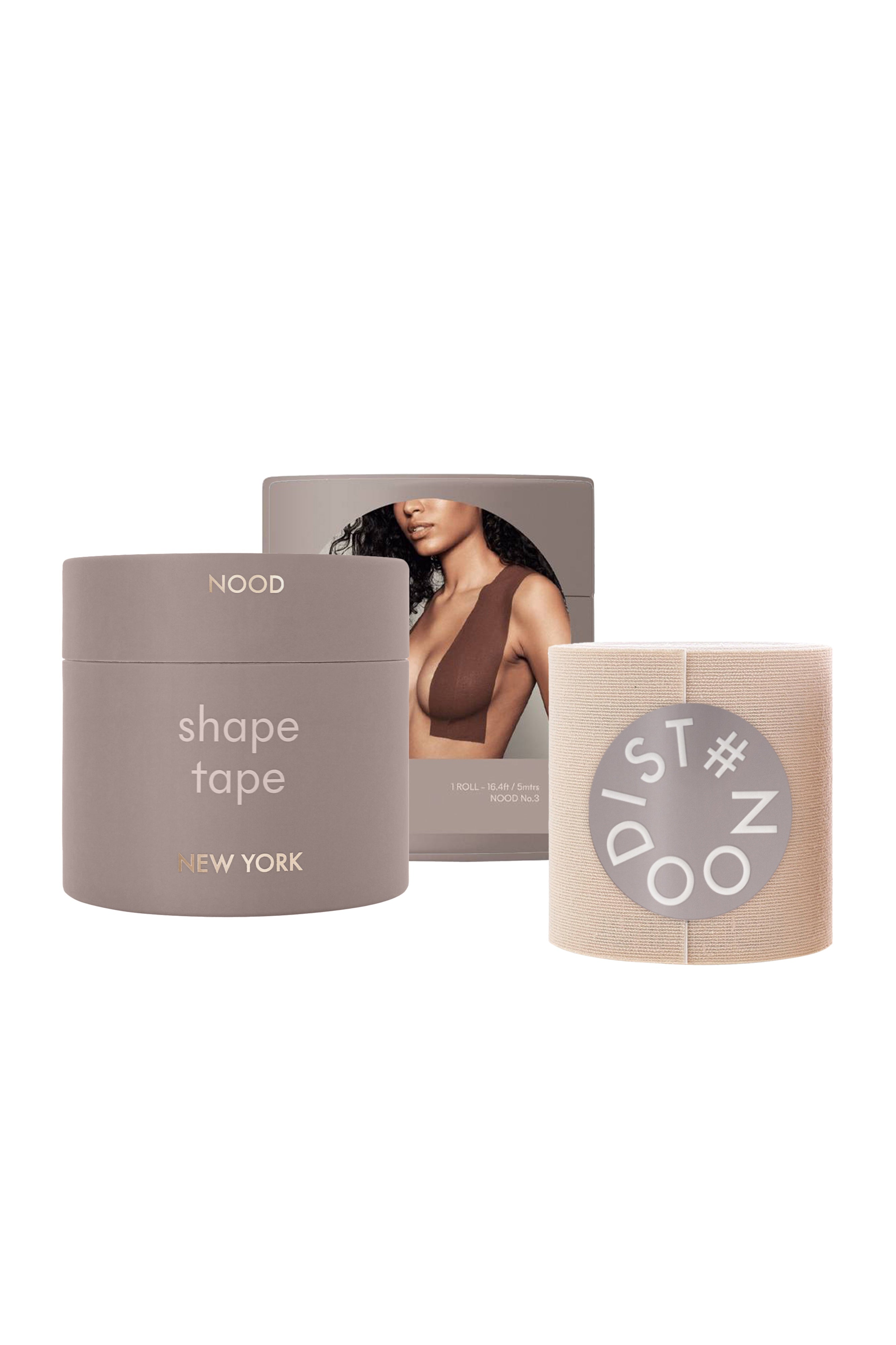 Three New York Nood shape tape products on a white background: a gray tube labeled 'shape tape NEW YORK', a beige roll with a gray circular 'ST#DOO' logo, and a gray box featuring a model photo.