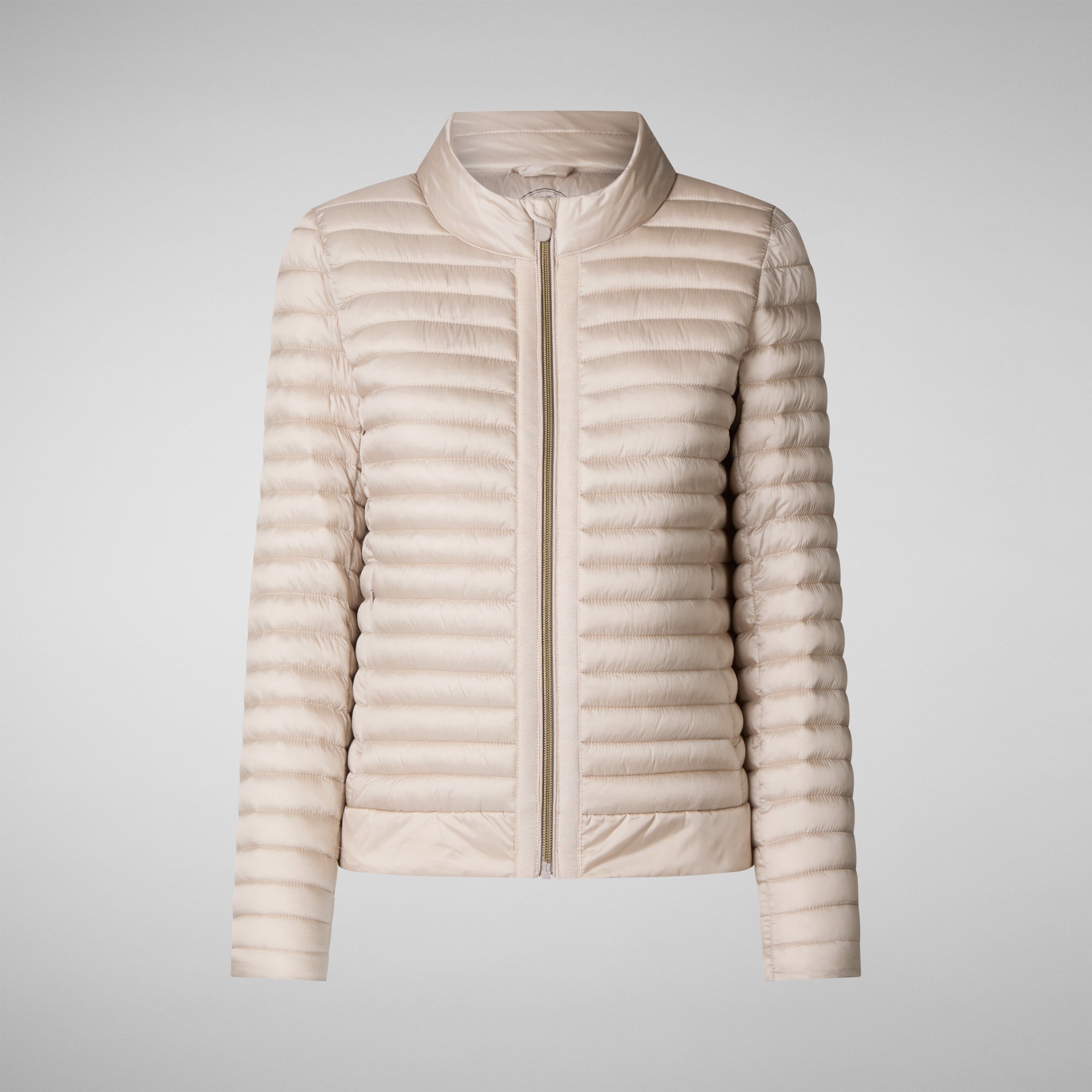 Beige puffer jacket on a light gray background