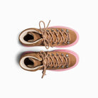 Pair of brown boots with pink soles on a white background